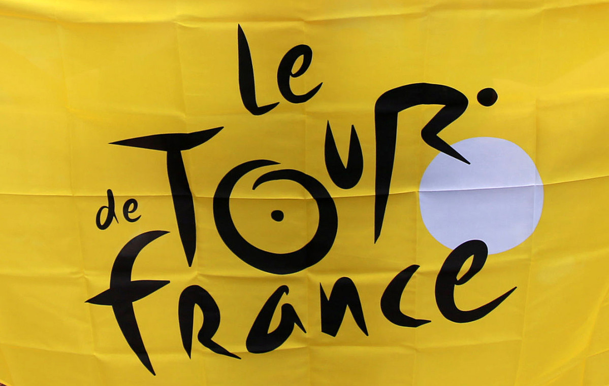 FILED - 07 July 2014, England, London: A general view of the Tour de France logo on a flag. Due to coronavirus restrictions, the Tour de France will not be able go ahead on 27 June as originally plann