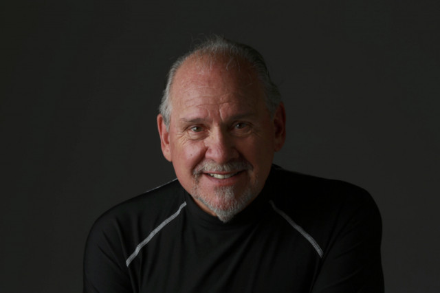 Larry Brilliant in black