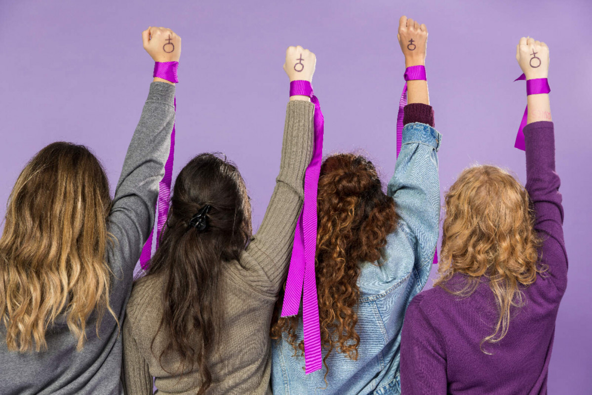 Group female activists protesting together 1600 1067