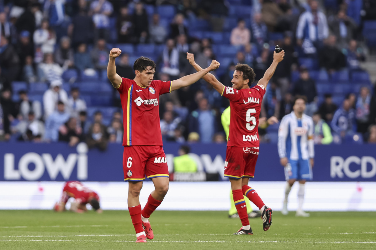 EuropaPress 7385640 mario martin and luis milla of getafe cf celebrates the victory during the
