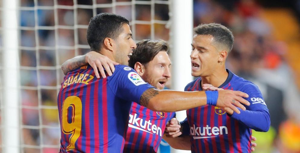 Suarez messi Coutinho valència barça lliga reuters