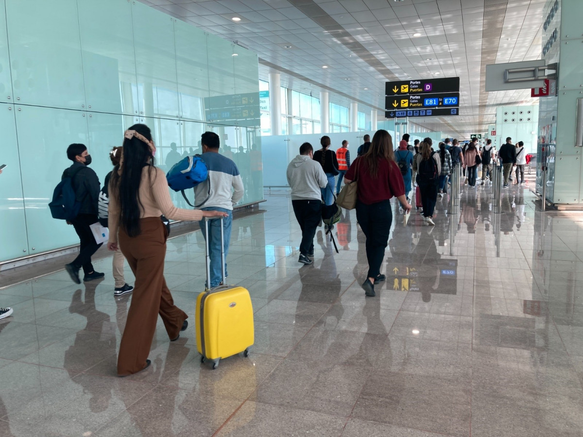 Passatgers a l'aeroport de Barcelona-El Prat.