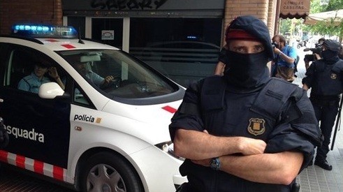 Mossos braços creuats